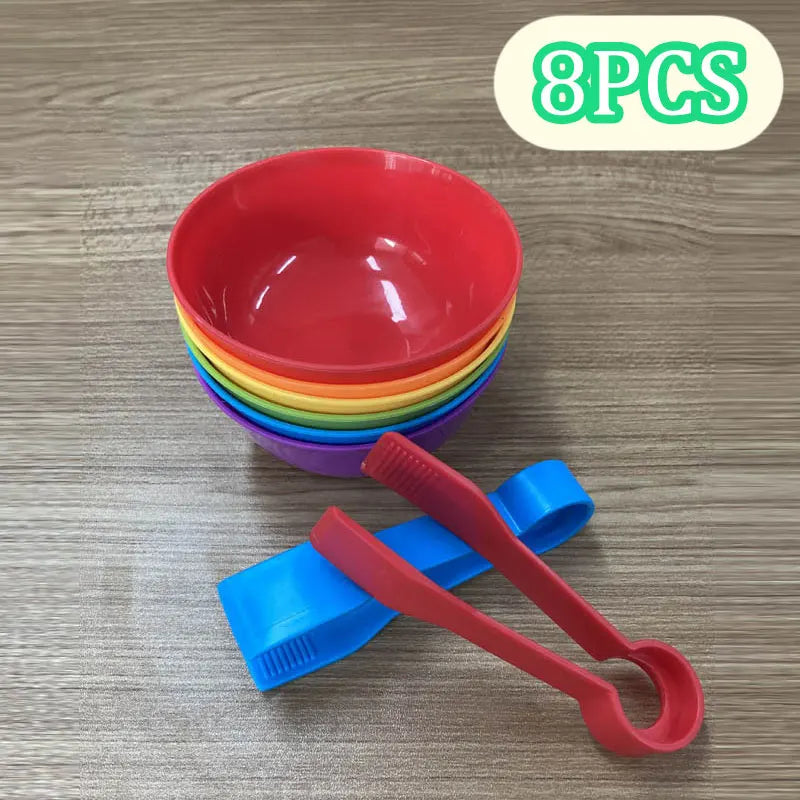 A set of eight colorful plastic bowls and a red sorting tool for a Montessori animal sorting and counting toy set.
