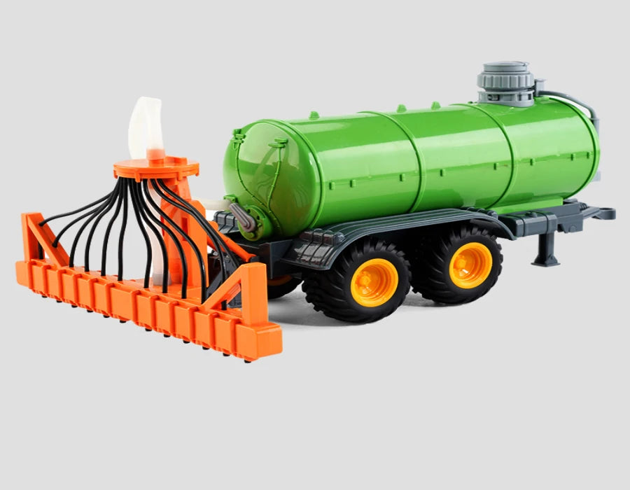 A green remote control tractor with a trailer and lights is shown on a gray background.