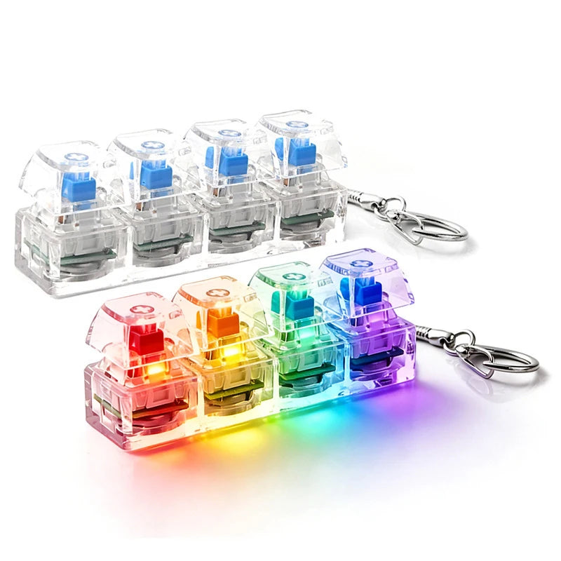 A set of illuminated keyboard key fidget toys in various colors attached to a metal clip.