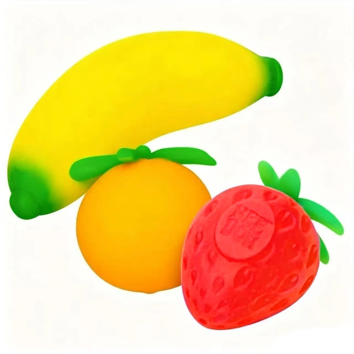 A set of squishy fidget toys featuring a yellow banana, orange, and red strawberry.