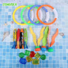 A set of colorful rings and various dive toys including starfish, fish, and glass shapes on a blue background.