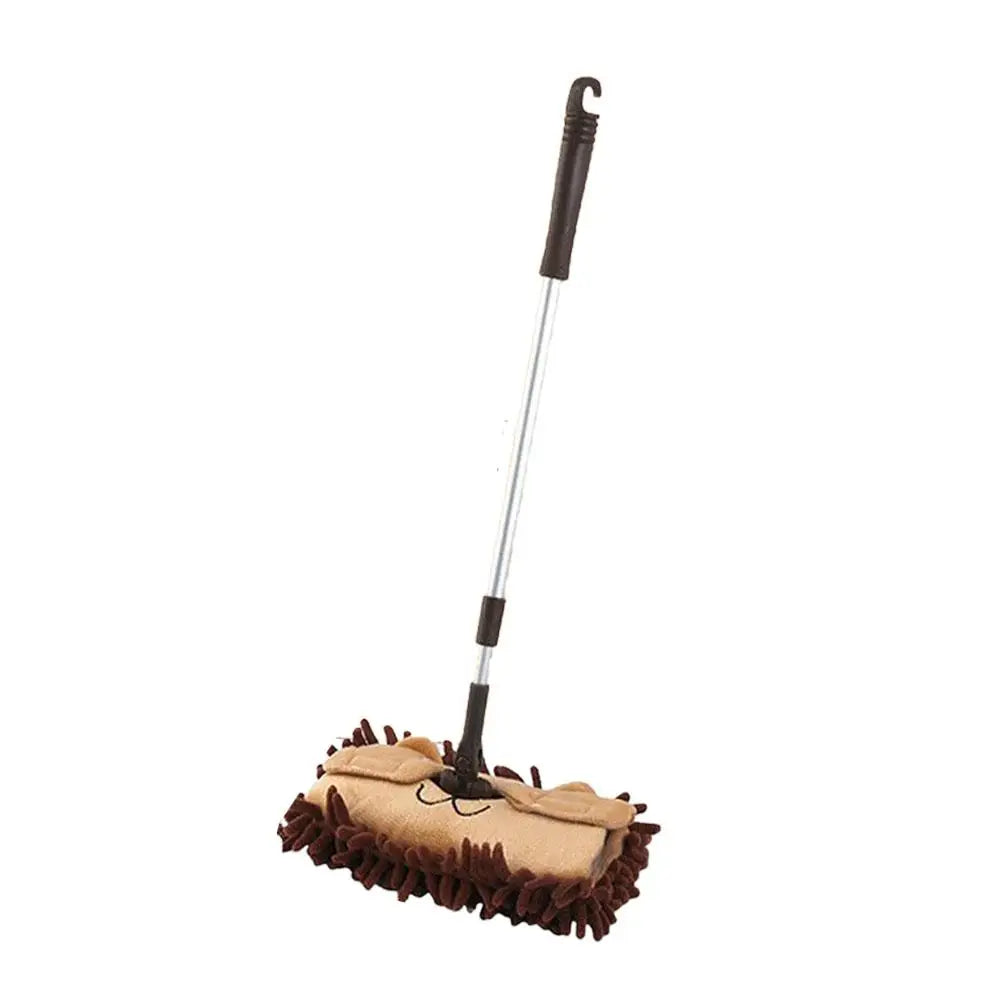 Un ensemble balai et pelle de jeu pour enfants avec poignée et tête de brosse.