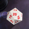 A white D20 polyhedral die showing the number 13 and 20, resting on a dark surface.