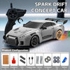 A silver RC drift concept car is shown next to its black remote control and various configuration parts.