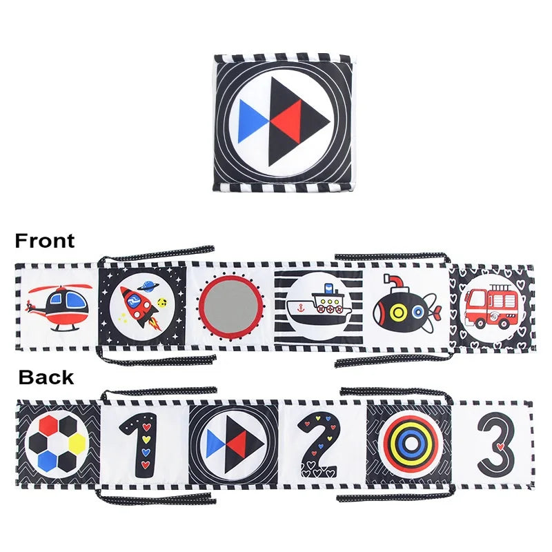 A set of sensory cloth books featuring various numbers and symbols like a triangle, a fish, and a train.