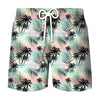 Men's beach swim shorts with a tropical coconut tree print featuring pink and teal palm fronds.