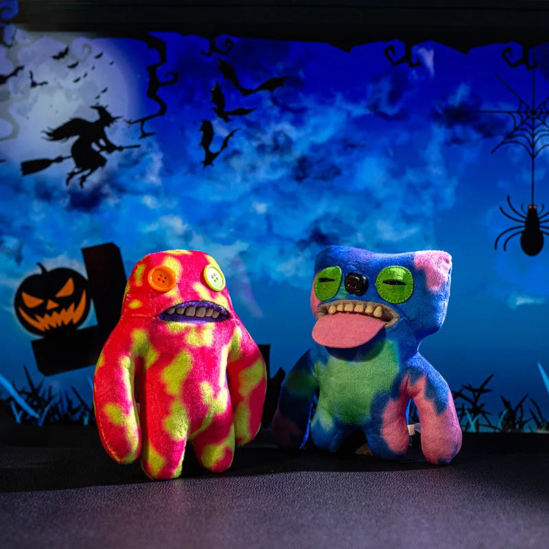 A colorful, fuzzy monster plush doll with big teeth is displayed against a dark blue Halloween-themed background.