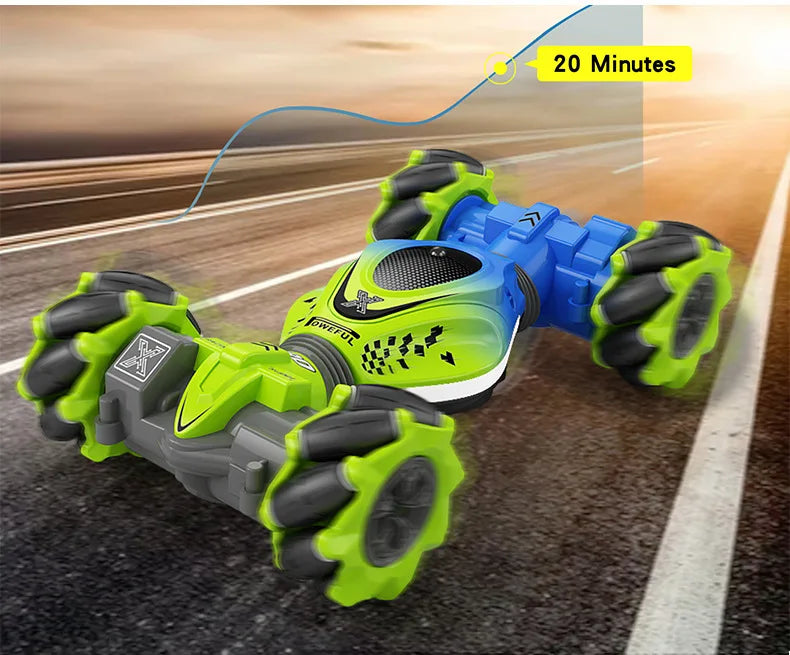 A bright green and blue remote control stunt car is shown driving on an asphalt track.
