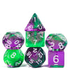 A set of seven translucent polyhedral dice in shades of green and purple.