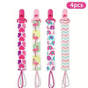 Set of four soft pacifier clips with double-sided prints for babies in various colors