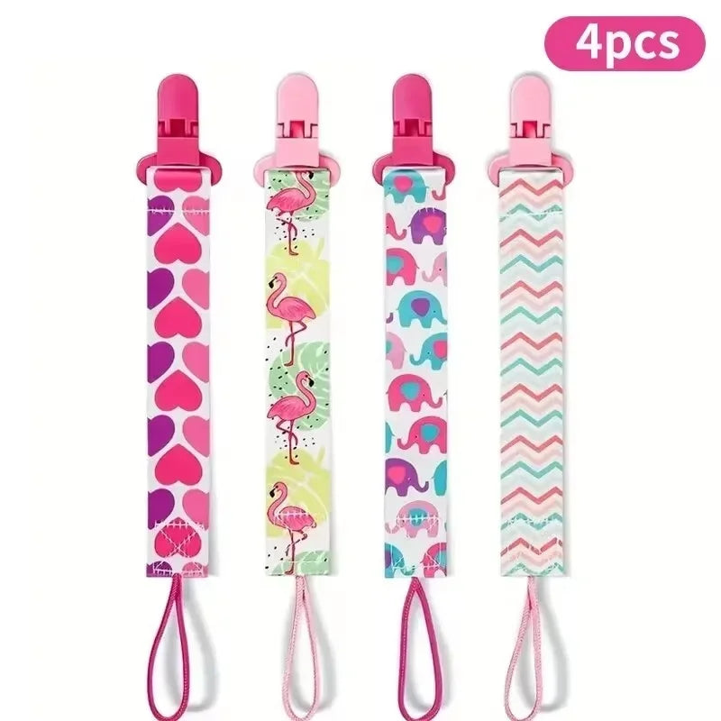Set of four soft pacifier clips with double-sided prints for babies in various colors