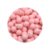 A circular arrangement of pink silicone beads in various sizes for DIY jewelry making