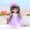A 17cm articulated princess doll with long purple hair and a lavender dress, posing on a white surface.