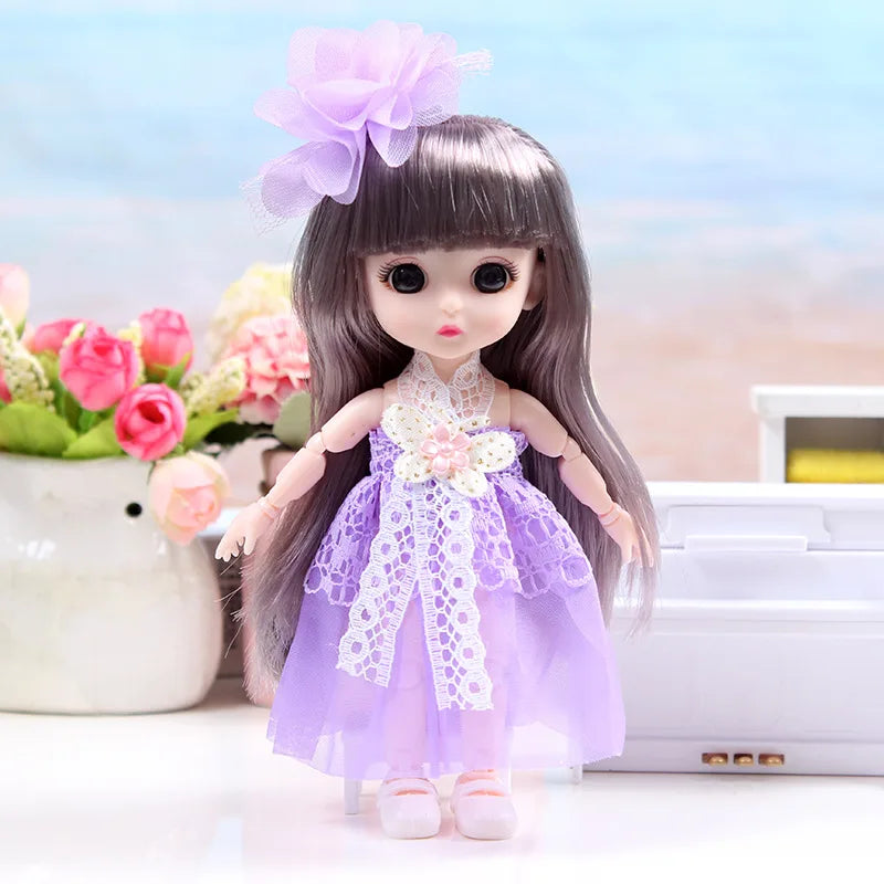 A 17cm articulated princess doll with long purple hair and a lavender dress, posing on a white surface.