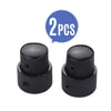 A set of two black dual concentric stacked control knobs for electric guitar and bass.