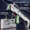 A white folding water gun is shown in both folded and expanded sizes on a dark surface.