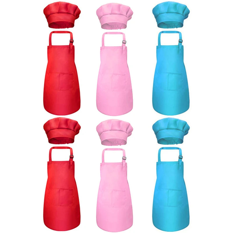 A set of pink and red chef aprons and hats for kids, displayed vertically.