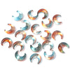 A collection of iridescent moon-shaped glass beads for DIY jewelry making