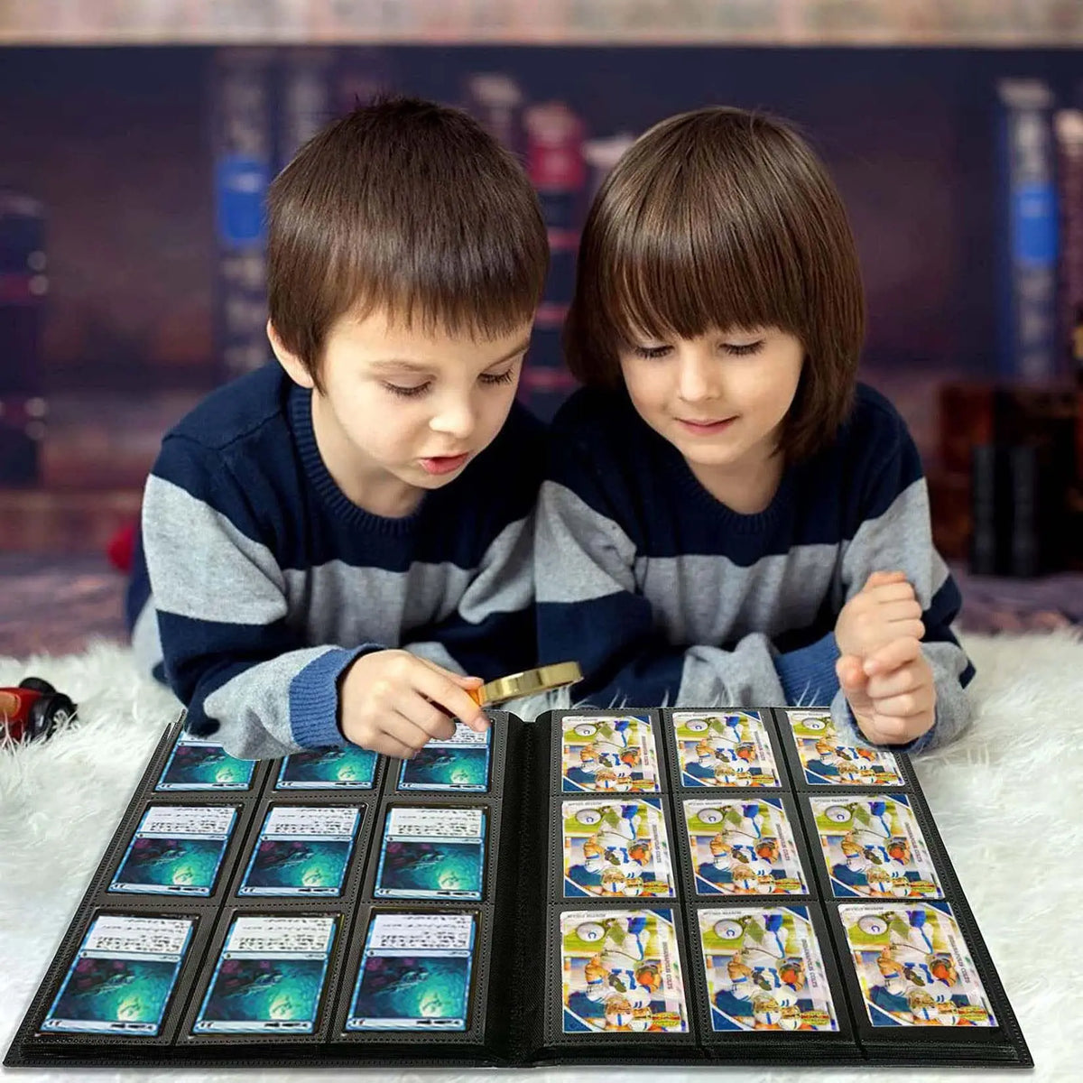 A boy and a girl look at a durable card collection binder filled with various trading cards.