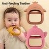 A baby is holding a yellow silicone anti-feeding teether while two pink silicone teethers are displayed above.