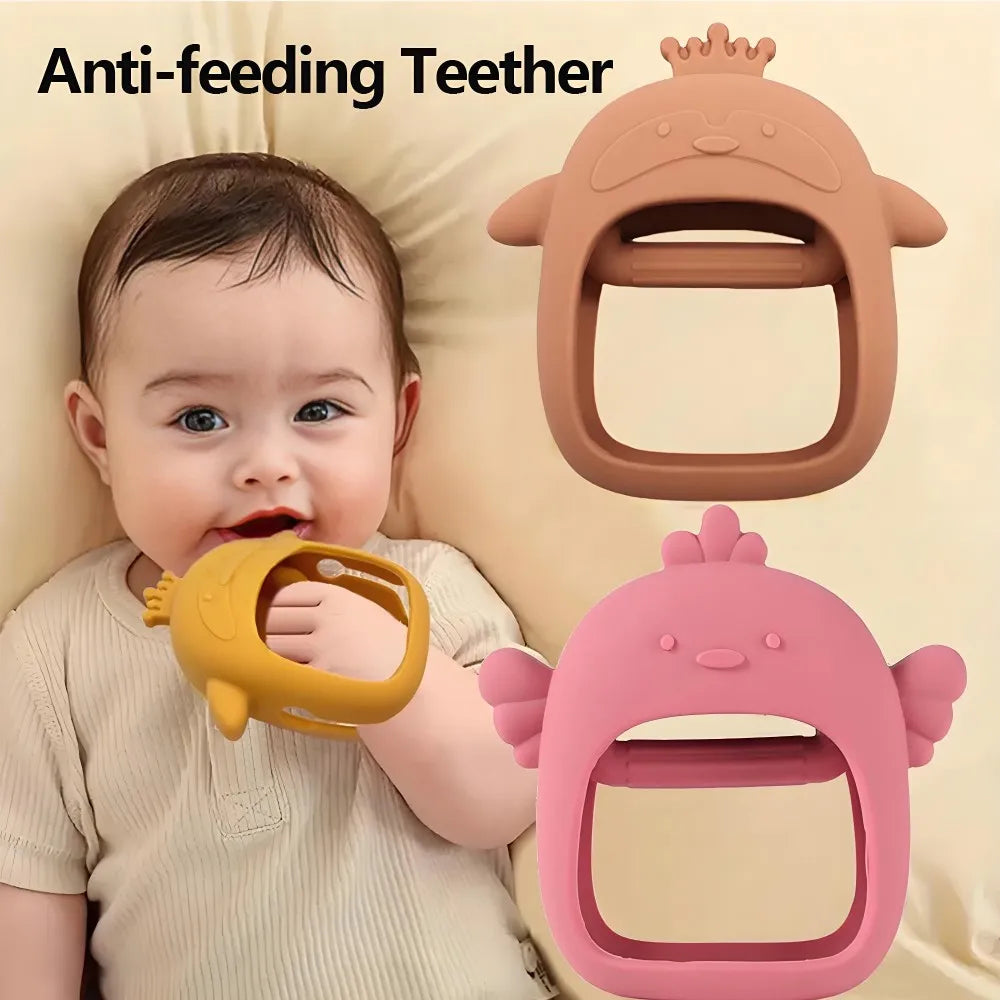 A baby is holding a yellow silicone anti-feeding teether while two pink silicone teethers are displayed above.