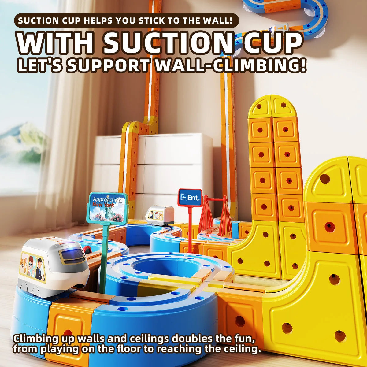 A yellow and blue magnetic 3D cube train set with flexible tracks is shown in a playroom setting.