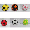 A set of twelve handmade crochet hacky sack balls in various colors including yellow, black, orange, pink, red, white, and li
