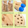 Wooden memory match sticks with blue and natural wood grips shown alongside a wooden chess piece and a wooden board.