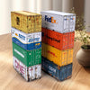 A stack of various colored industrial iron storage boxes, including FedEx, Runtec, and DHL brands, on a wooden surface.