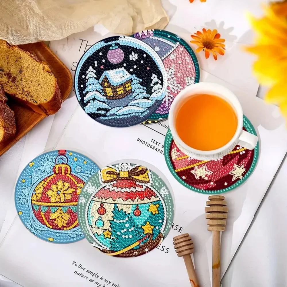 An arrangement of eight diamond painting coasters featuring winter, festive, and celestial designs.