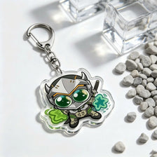 Silver and green anime-inspired acrylic keychain charm featuring a character in a futuristic helmet