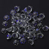 A pile of 50 clear and purple glass cherry blossom flower beads for jewelry making