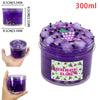 A jar of purple grape slime putty with edible glitter and small purple candies, showing the product size and texture.