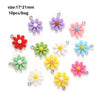 A collection of colorful DIY sunflower charms for jewelry making, including purple, pink, green, and yellow flowers.