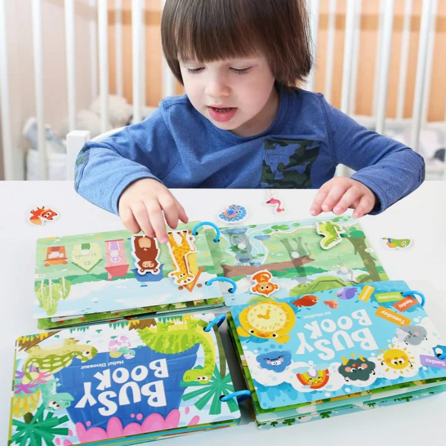 A child is looking at a colorful Montessori word recognition quiet book with interactive stickers.