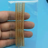 A set of transparent, flexible ring size adjusters packaged in a clear plastic sleeve.