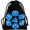A black drawstring bag filled with a set of transparent polyhedral dice.