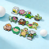 A set of cute green turtle enamel pins featuring various designs and sayings on a light blue background.