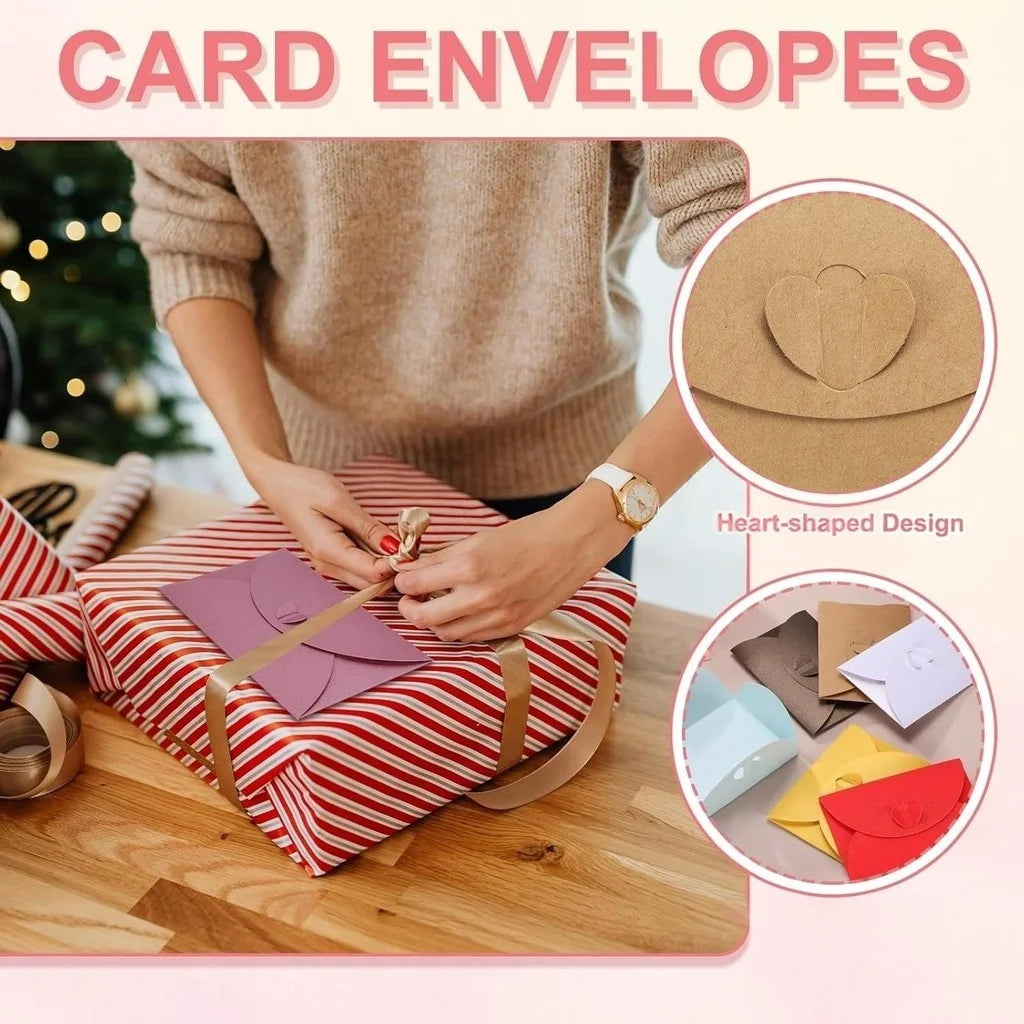 A person is preparing mini kraft paper envelopes with heart clasps for gift cards on a wooden surface.