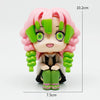 A figure set of Tanjiro and Nezuko from Demon Slayer, featuring pink hair and green accents.