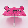 A pink bear-themed mini doll umbrella with black ears and a smiling face.