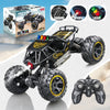 Black off-road RC car with lights and rechargeable battery shown next to accessories and a controller.
