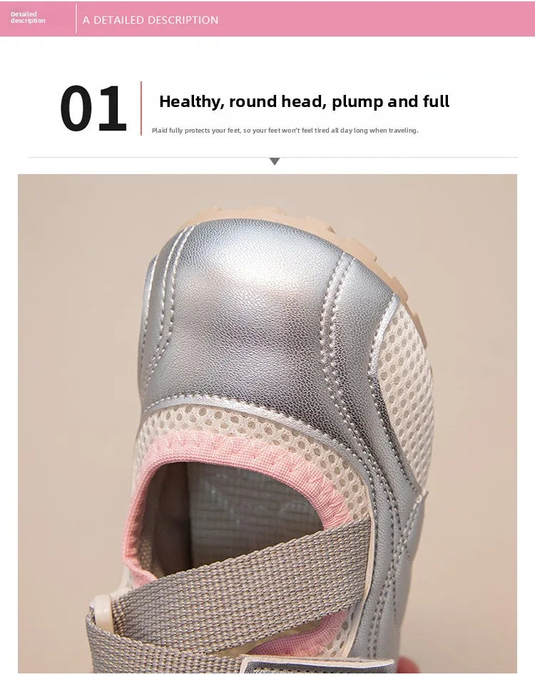 A close-up view of a silver and pink girls' casual slip-on shoe with a breathable PU upper.