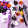 A collection of Halloween silicone beads featuring 3D bat and pumpkin shapes for jewelry making.