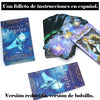 A deck of Spanish Angel Oracle cards titled Baraja de los Ángeles, featuring blue and purple designs.