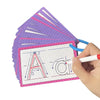 A set of purple flash cards with letters A and $	ext{O}$ for tracing practice, held by a hand.