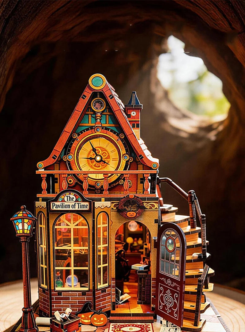 A detailed wooden miniature kit of a time pavilion building featuring stained glass windows and a staircase.