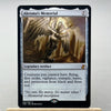 A Magic: The Gathering card named Akroma's Memorial featuring a winged figure and text describing creatures with flying, firs