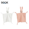 A white and pink soft cotton muslin baby comforter blanket with bunny ears
