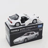 A white Mazda Savanna RX-7 die-cast model by Tomica featuring a black interior and displayed in its packaging.